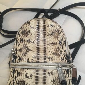 Michael Kors small back pack . Like brand new .